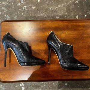 Jimmy Choo “lizard skin” print ankle boots.